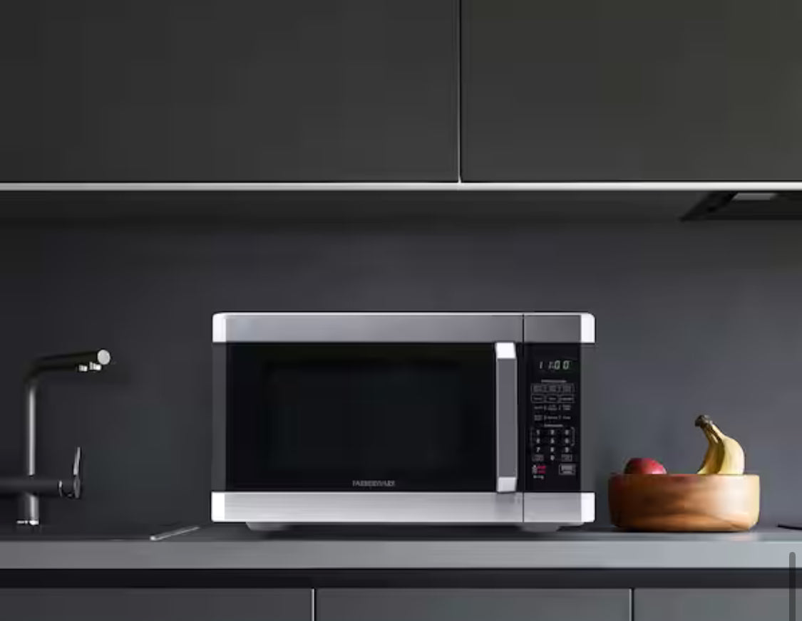 1.6 cu. Ft. 1100- Watt Countertop Microwave Oven with Smart Sensor in Stainless Steel with Platinum