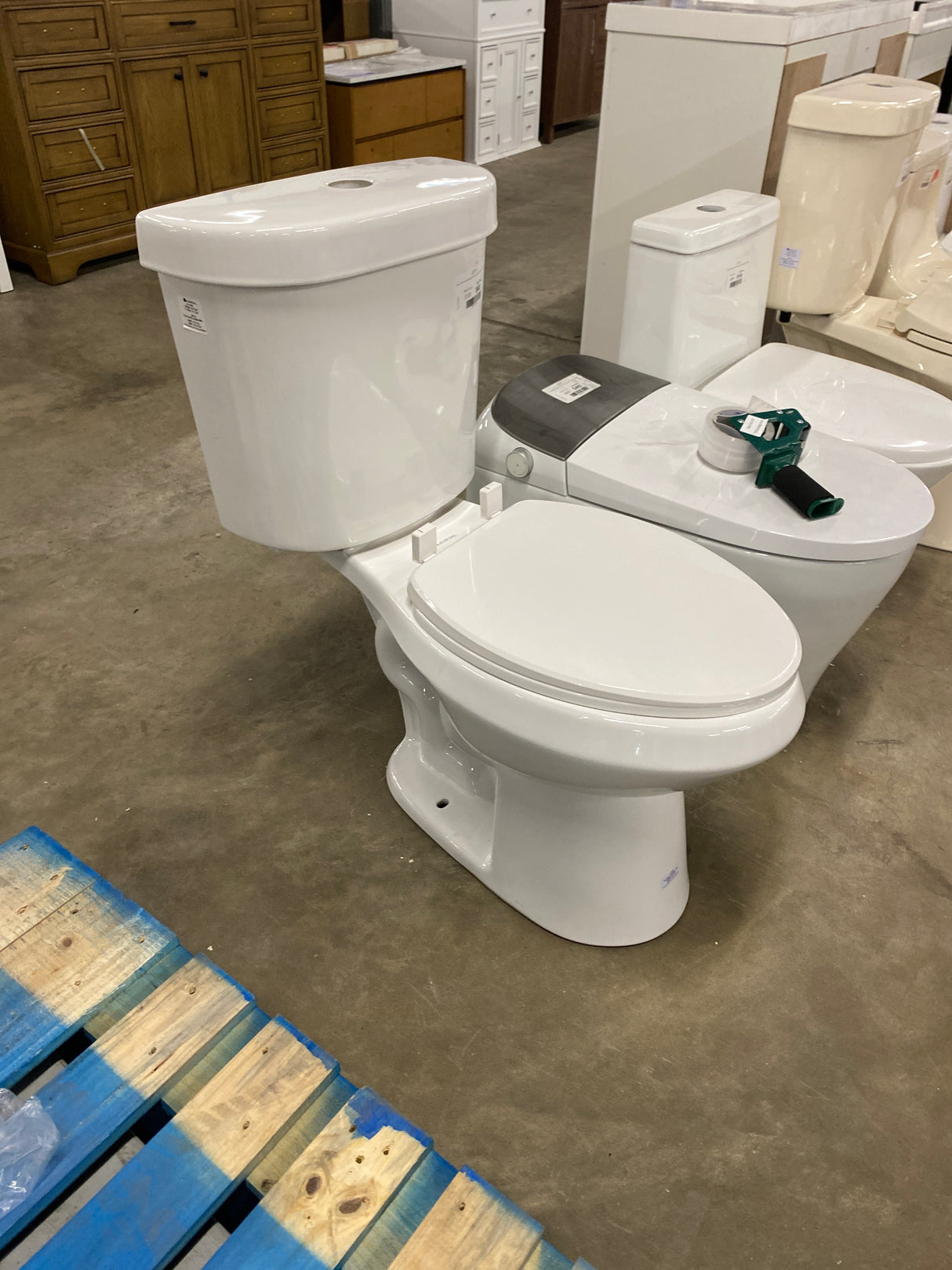 2-piece 1.1 GPF/1.6 GPF High Efficiency Dual Flush Complete Elongated Toilet in White, Seat Included