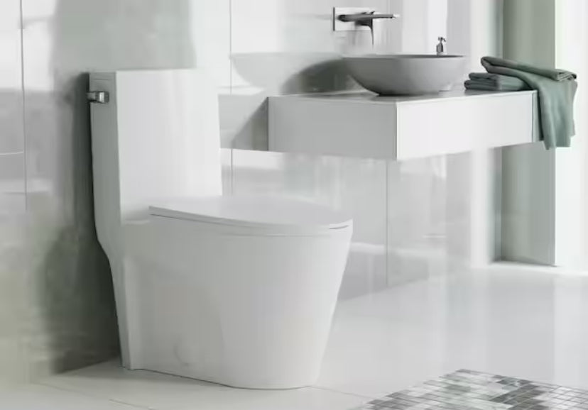 St. Tropez 1-Piece 1.28 GPF Single Flush Elongated Toilet in White Seat Included