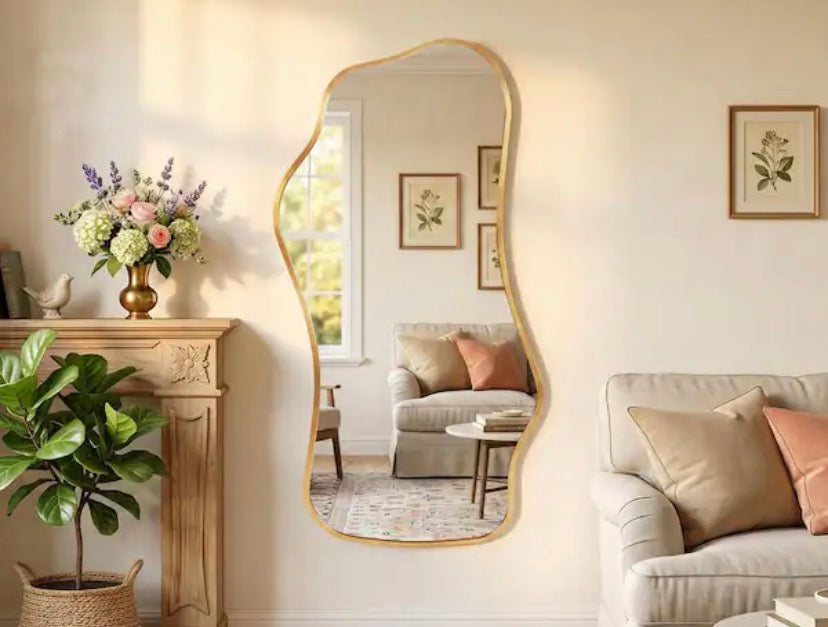 47 in. W x 22 in. H Gold Aluminum Alloy Framed Irregular Wall Mirror