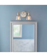 Evelyn 16.25 in. 2-Light Brushed Nickel Industrial Vanity with Clear Glass Shades
