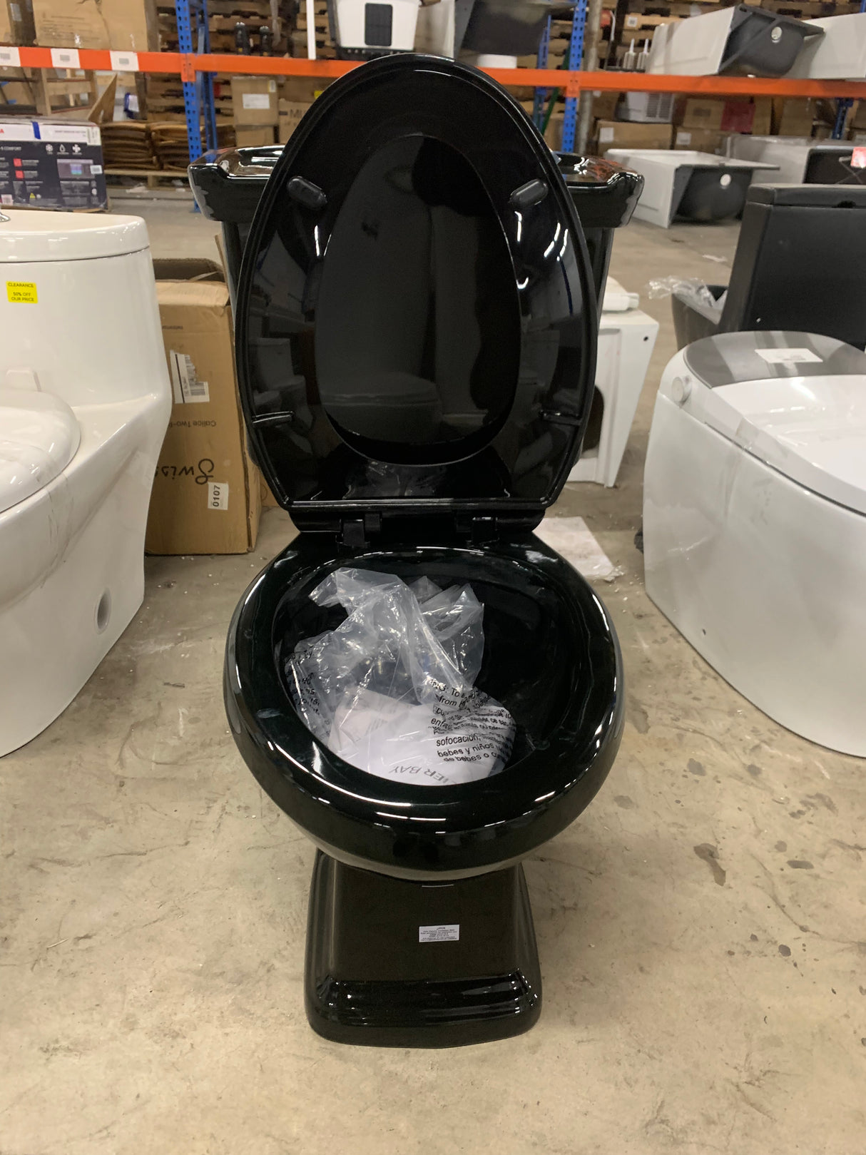2-piece 1.0 GPF/1.28 GPF High Efficiency Dual Flush Elongated Toilet in Black, Seat Included