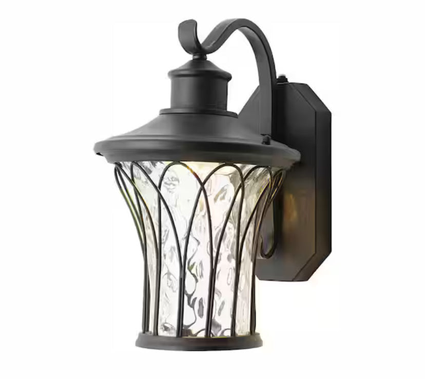 Avia Falls 14.5 in. Black Dusk to Dawn Large LED Outdoor Wall Light Fixture with Clear Water Glass